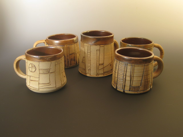Handle Cups with design